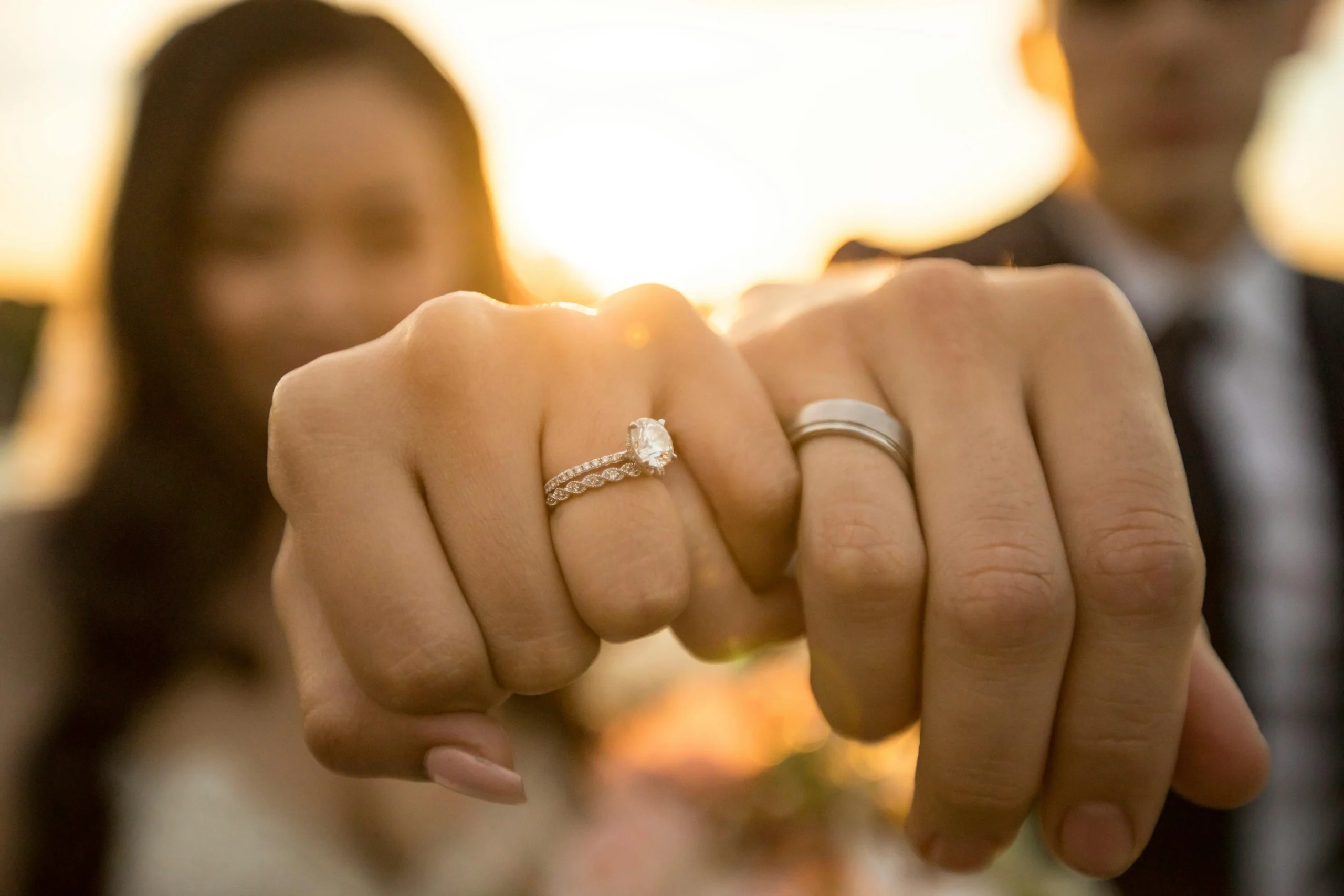 Understanding Agape Love Meaning in Relationships: A Biblical Exploration A married couple exemplifying agape love by sharing a tender moment in a sunlit garden, surrounded by blooming flowers. Relationships